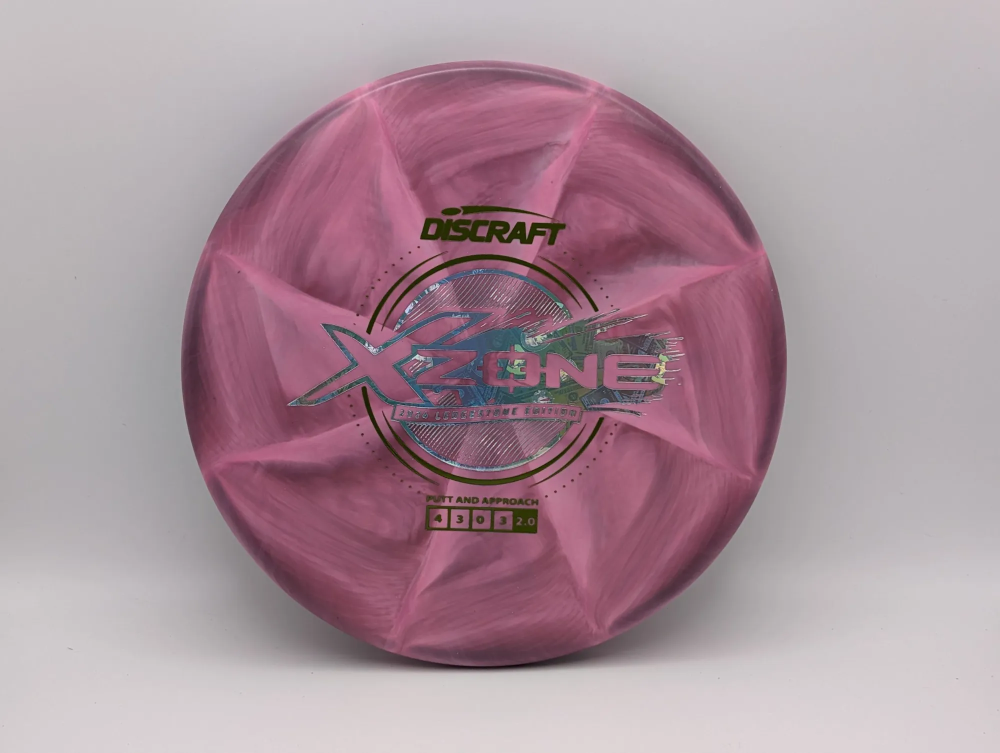 Photo of this disc, X Swirl, 173-174 g, Maroon/Money, D7498