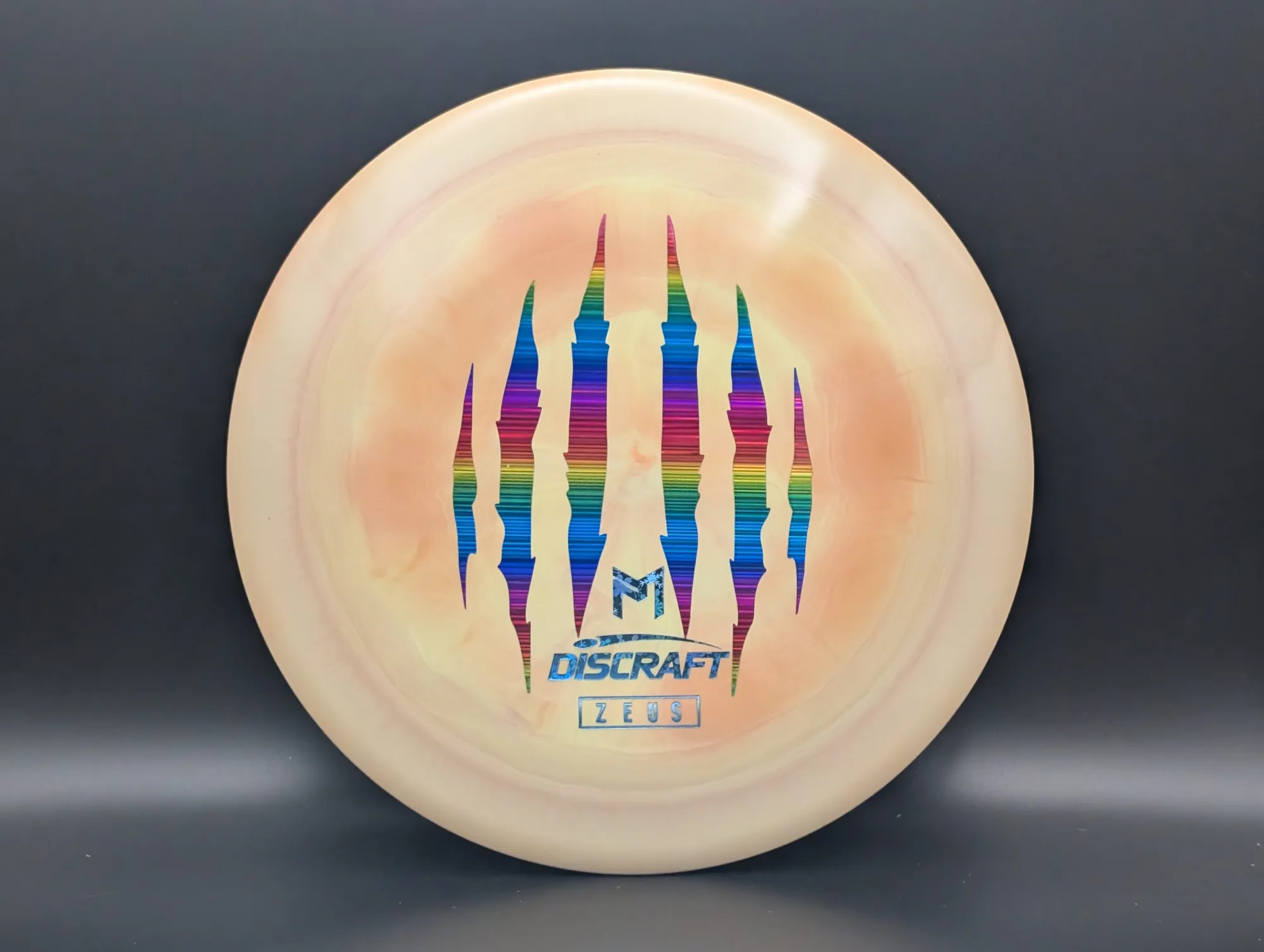 Photo of this disc, 173-174 g, Pale Orange/Rainbow