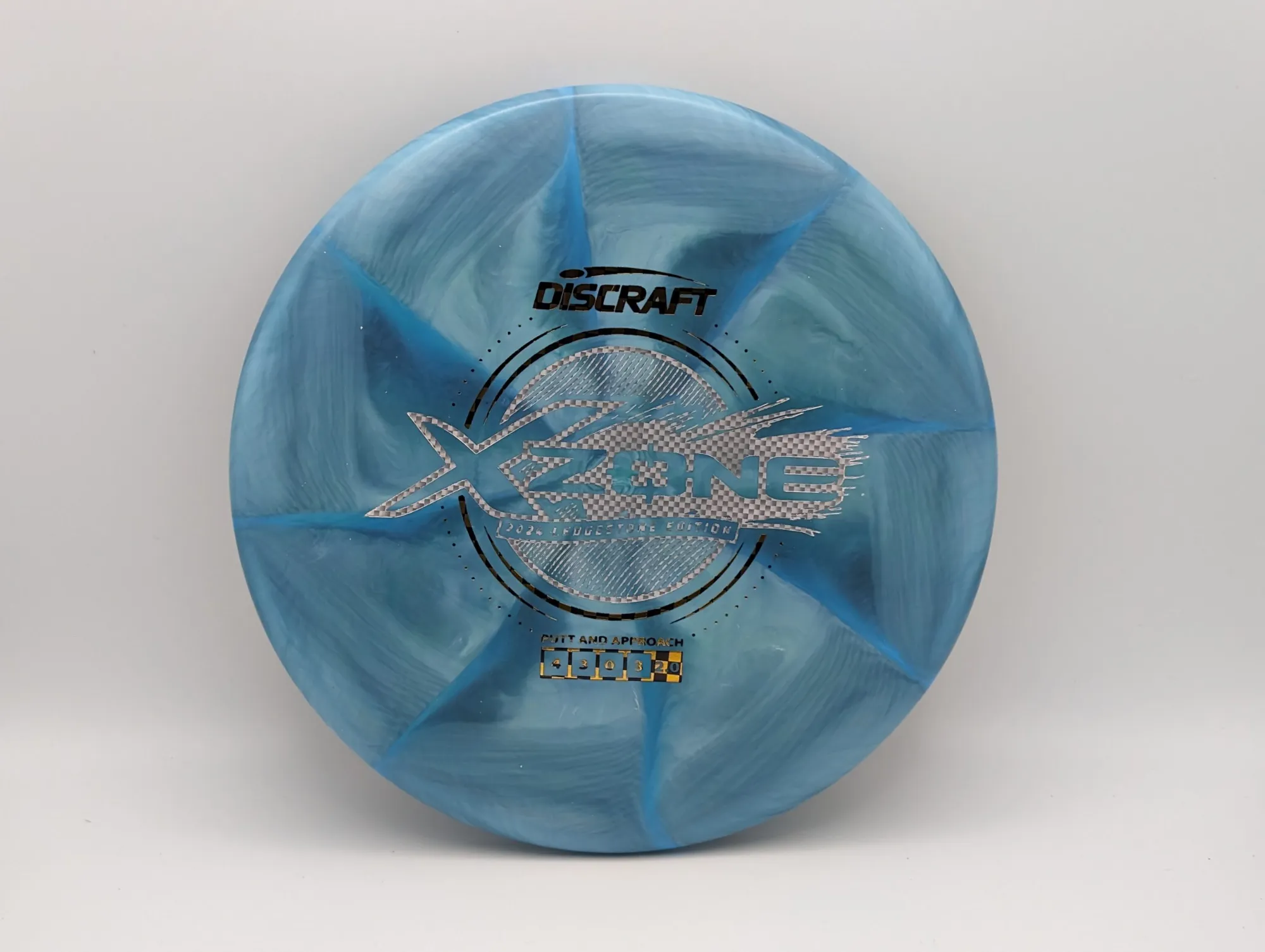 Photo of this disc, X Swirl, 173-174 g, Aqua/Checkered, D7495
