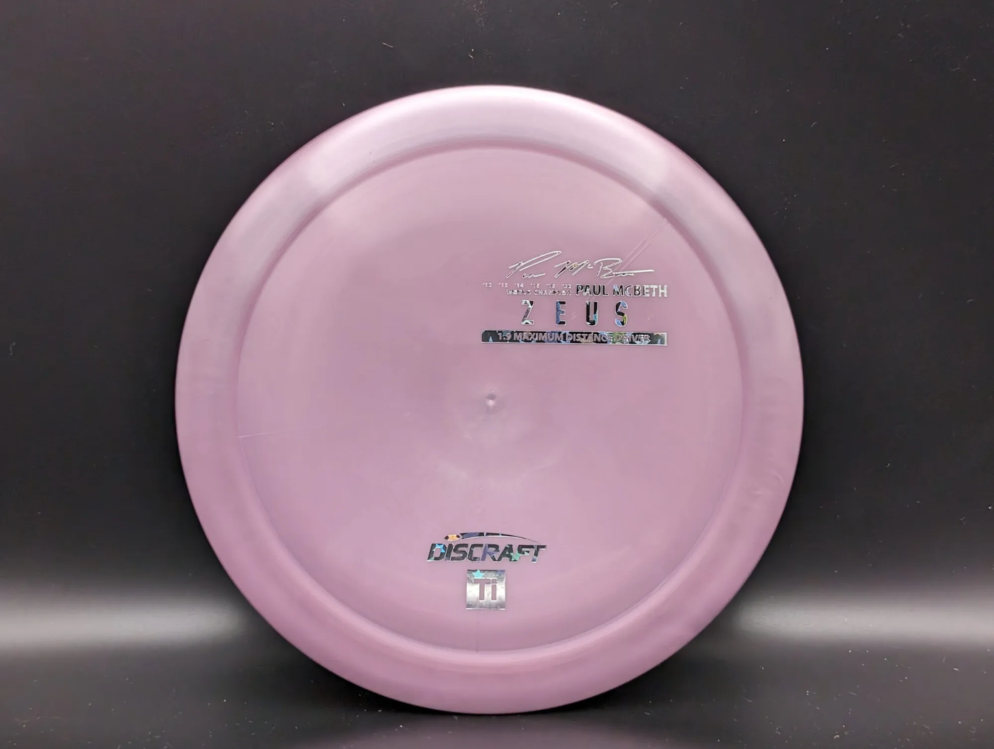Photo of this disc, Ti, 173-174 g, Purple-Gray/Stars
