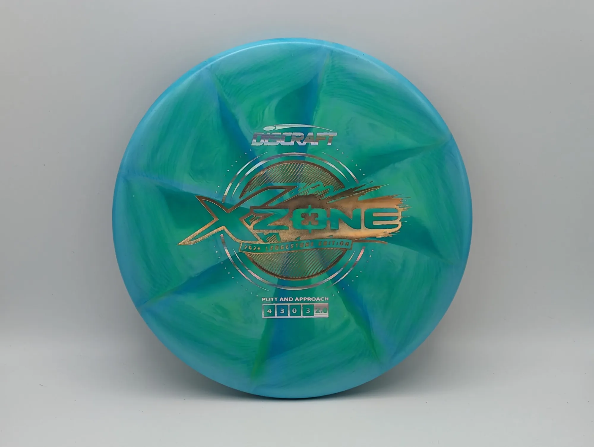 Photo of this disc, X Swirl, 173-174 g, Green/Gold, D7499