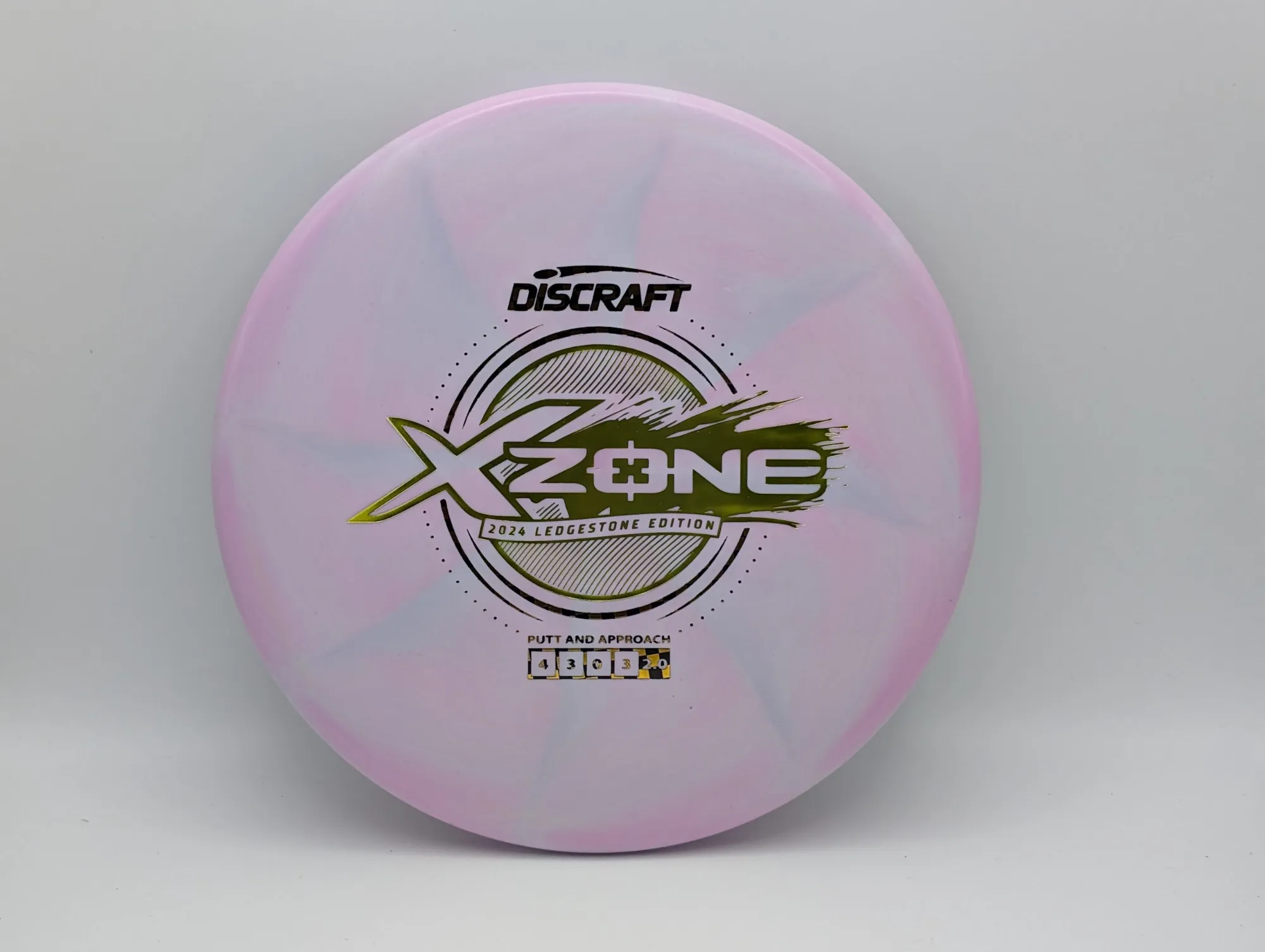Photo of this disc, X Swirl, 173-174 g, Purple/Gold, D7503